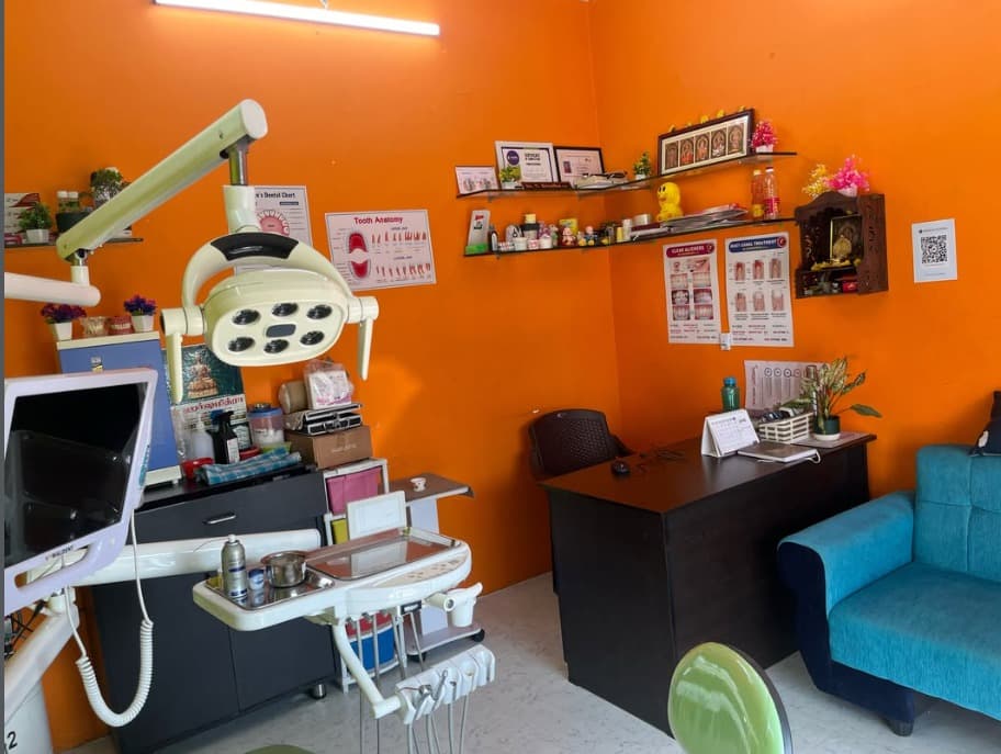 Treatment room at Clear Dental Care with dental chair, operating light and patient seating